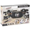 A toy barber set presented in its retail packaging. Produktbild-Vorschau