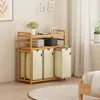 A laundry basket with shelves and drawers in a bedroom setting. Anteprima dell’immagine prodotto