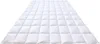 A white quilted duvet laid out flat on a white background. Produktbild-Vorschau