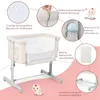 A baby bassinet with various features highlighted by text and close-up images. Produktbild-Vorschau