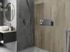 A modern bathroom with a shower and vanity area, featuring a built-in shelf. Náhled obrázku produktu