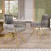 Two dining chairs in a dining room setting. Produktbild-Vorschau