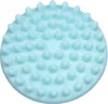 A close-up, top-down view of a light blue facial cleansing brush head with many small, rounded nubs. Náhled obrázku produktu
