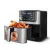 A black and silver air fryer with a basket full of fried chicken wings, shown on a white background. Produktbild-Vorschau
