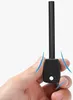 A hand holding a fire starter. Produktbild-Vorschau