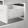 Close-up view of an open white drawer with metal slides. Anteprima dell’immagine prodotto
