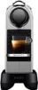A Nespresso coffee machine with a cup of espresso. Podgląd zdjęcia produktu
