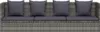 A studio shot of a grey rattan sofa with dark grey cushions. Podgląd zdjęcia produktu