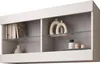 A white wall-mounted display cabinet with glass shelves, showcasing decorative items and books. Náhled obrázku produktu