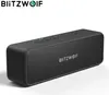 A black portable Bluetooth speaker with controls on top, presented on a white background. Produktbild-Vorschau