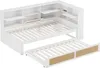 A white sofa bed with a pull-out trundle bed and built-in shelving. Voir les images du produit