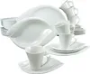 A collection of white porcelain dinnerware, including plates, bowls, and cups, arranged in a studio setting against a white background. Produktbild-Vorschau