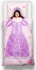 A young girl is lying on a bed with princess-themed bedding. Podgląd zdjęcia produktu