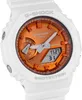 A close-up of a white G-Shock watch with an orange face and digital display. Anteprima dell’immagine prodotto