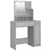 A vanity table with a mirror and lights. Náhled obrázku produktu