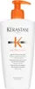A white bottle of Kérastase shampoo with an orange pump dispenser. Produktbild-Vorschau
