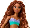 Close-up portrait of a Barbie doll with long braided brown hair and a bikini top. Anteprima dell’immagine prodotto