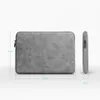 A gray laptop sleeve is shown with dimensions indicated. Produktbild-Vorschau