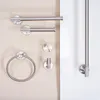 A collection of brushed steel bathroom accessories mounted on a wall. Podgląd zdjęcia produktu