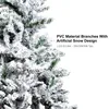 Close-up of a snow-covered artificial Christmas tree with text overlay. Produktbild-Vorschau