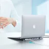 A person's hands are shown near a laptop connected to a docking station. Produktbild-Vorschau