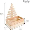 A wooden crate with a Christmas tree-shaped back panel, showing dimensions. Produktbild-Vorschau