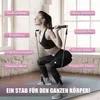 Frau in schwarzer Activewear macht Kniebeugen mit einem schwarzen Pilates-Bar-Set und zeigt Vorteile wie straffe Arme und einen festen Bauch Productafbeelding-voorbeeld