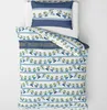A top-down view of a children's bedding set featuring Minions characters. Produktbild-Vorschau