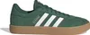 A side view of a green Adidas sneaker with white stripes and a brown sole. Produktbild-Vorschau