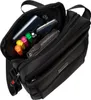 An open black messenger bag with various items inside. Produktbild-Vorschau