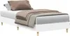 A white bed frame with bedding and pillows. Náhled obrázku produktu