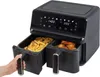 A dual-basket air fryer with food in both baskets, and a hand pulling out one of the baskets. Voir les images du produit