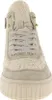 A close-up front view of a beige high-top sneaker with fluffy lining. Voir les images du produit