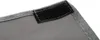 A close-up view of the corner of a gray fabric product with a black velcro strap attached. Náhled obrázku produktu