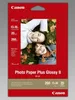 A package of Canon photo paper with a picture of two people on it. Náhled obrázku produktu