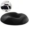 A black seat cushion is shown in the foreground, with a circular inset image showing a person sitting on a chair with the cushion. Produktbild-Vorschau