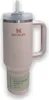A pink Stanley Quencher H2.0 Flowstate tumbler with a straw and handle, set against a white background. Produktbild-Vorschau