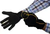 A person putting on a black glove, with a yellow loop highlighted. Anteprima dell’immagine prodotto