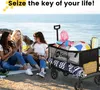 Three young women are sitting on a blanket by the sea, with a Sekey folding wagon filled with beach items next to them. Podgląd zdjęcia produktu