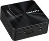 A black Gigabyte BRIX mini PC is shown from a front-diagonal angle on a black background. Produktbild-Vorschau