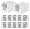 A set of white vacuum cleaner dust bags with gray attachment mechanisms are displayed against a white background. The top portion shows two complete bags, while the bottom portion displays multiple individual attachment mechanisms. Produktbild-Vorschau