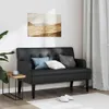 A black faux leather bench with cushions is placed in a room with a painting on the wall and curtains in the background. Náhled obrázku produktu