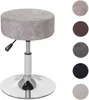 A stool with multiple fabric swatches displayed next to it. Anteprima dell’immagine prodotto