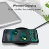 A smartphone is wirelessly charging on a charging pad next to a laptop. Produktbild-Vorschau