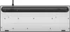 The underside of a keyboard with a brushed metal finish. Produktbild-Vorschau