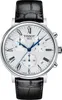 A close-up studio shot of a Tissot chronograph watch with a white dial and a black leather strap. Anteprima dell’immagine prodotto