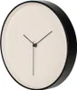 A minimalist wall clock with a beige face and black frame and hands. Anteprima dell’immagine prodotto