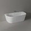A white freestanding bathtub against a gray wall. Produktbild-Vorschau