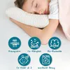 A child sleeping on a pillow, with icons and text describing product features. Produktbild-Vorschau