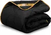A folded black comforter with gold trim and a gold ribbon with a logo and text. Podgląd zdjęcia produktu